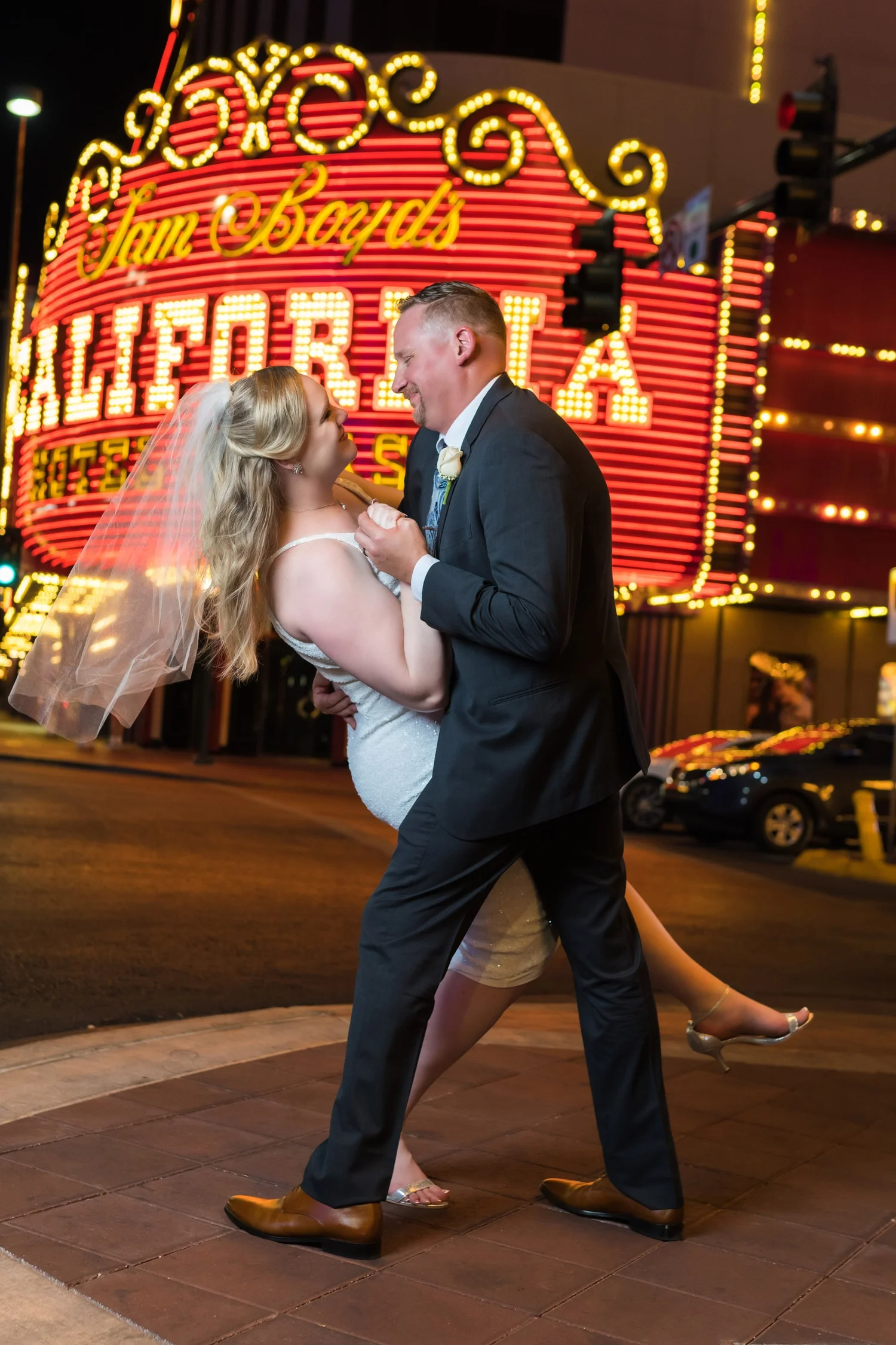 Las Vegas wedding photography — dancing under the Fremont Street neon